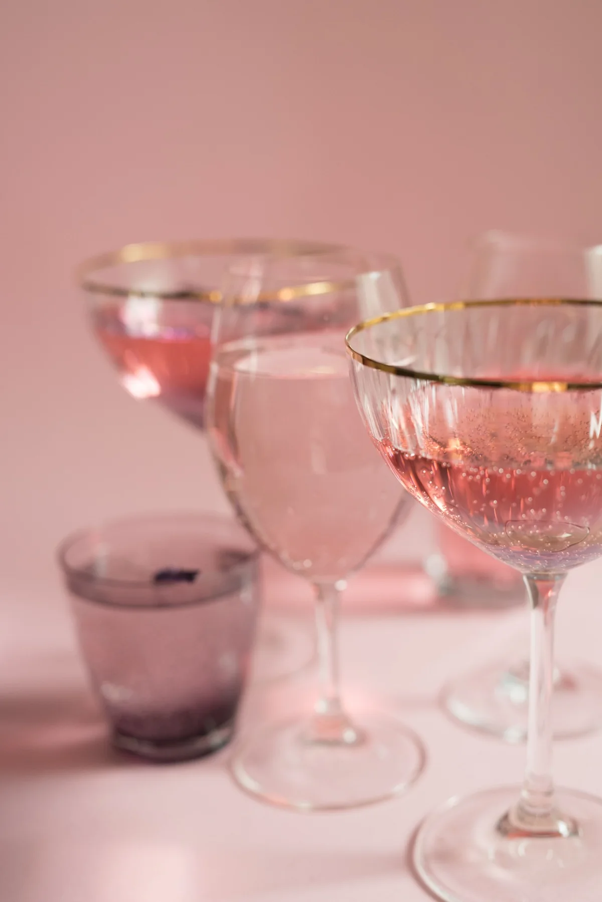 A collection of champagne coupes catching the light